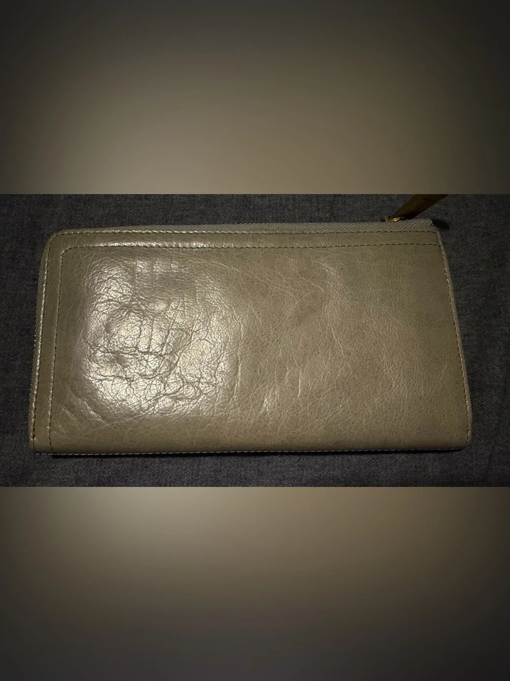 Margot “Gabby” zip around wallet in grey/beige with light blue accents.